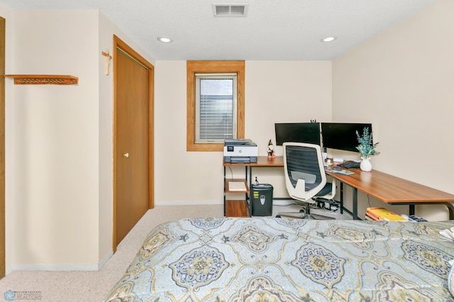 carpeted home office featuring recessed lighting, visible vents, baseboards, and a textured ceiling