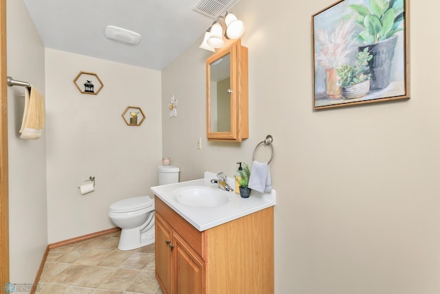 half bathroom featuring visible vents, baseboards, toilet, tile patterned floors, and vanity