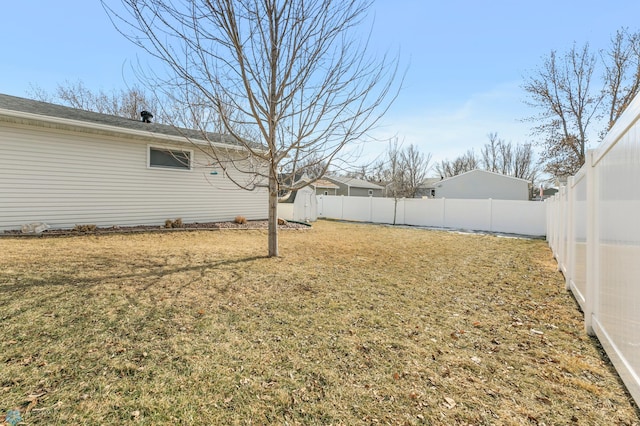 view of yard featuring a fenced backyard