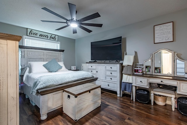 bedroom with dark wood finished floors and a ceiling fan