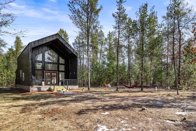 back of house featuring french doors