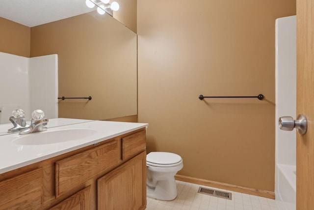 bathroom with vanity, visible vents, a bathing tub, walk in shower, and toilet