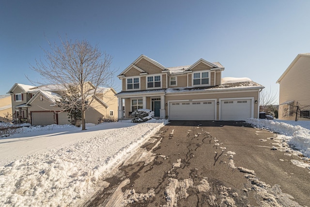 view of front of property with aphalt driveway