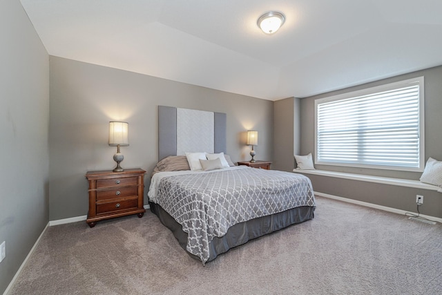 bedroom featuring baseboards and carpet floors