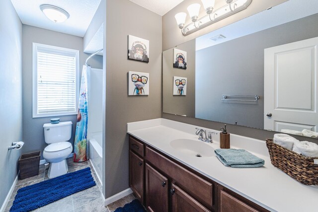 full bath featuring baseboards, toilet, vanity, and shower / bath combination with curtain