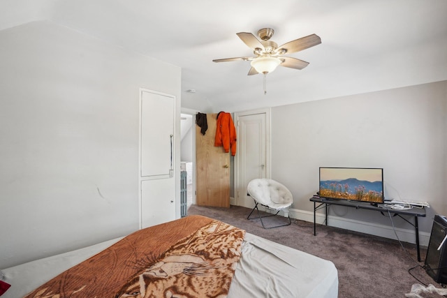 bedroom featuring carpet flooring, a ceiling fan, and baseboards