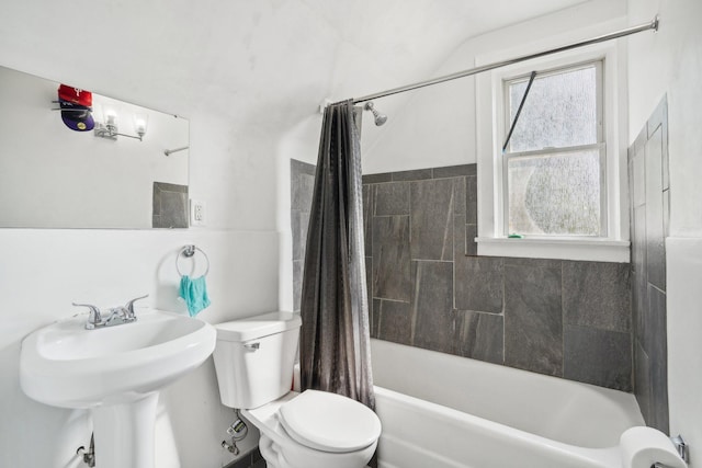 full bathroom with toilet and shower / bathtub combination with curtain