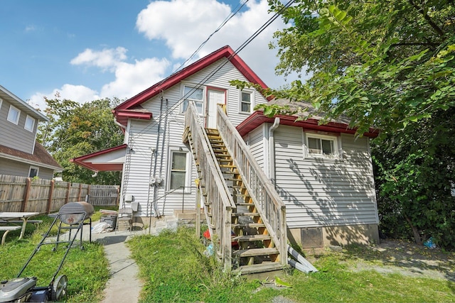 back of house with a patio area, stairway, and fence