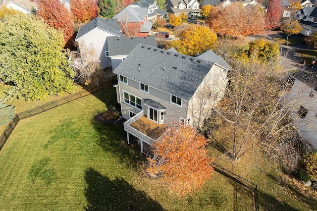 birds eye view of property with a residential view