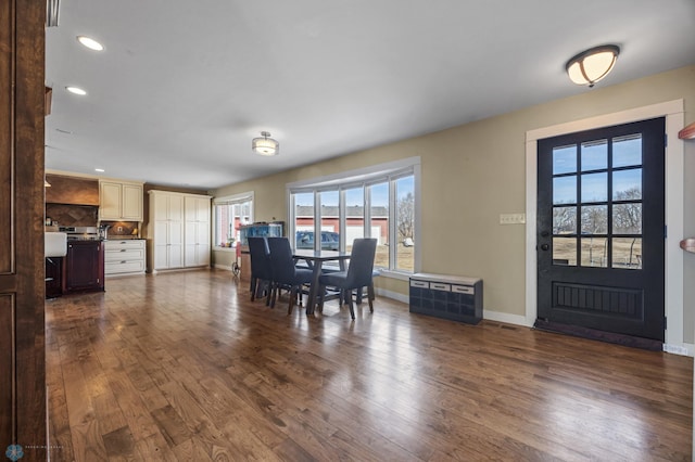 dining area with visible vents, recessed lighting, dark wood-style floors, and baseboards