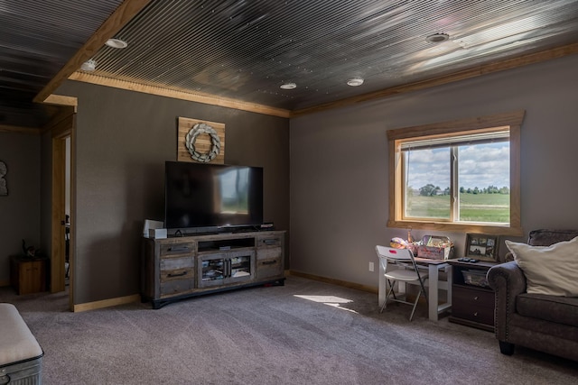 living area with baseboards and carpet floors