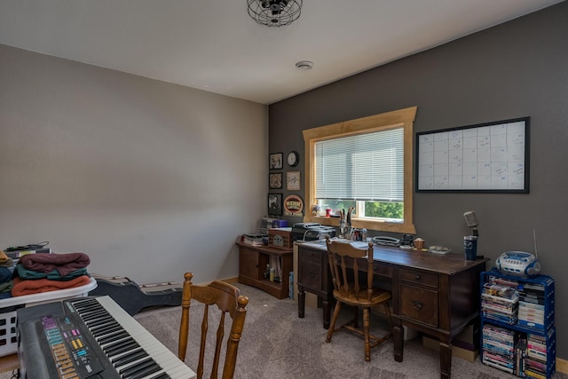 office area featuring light carpet