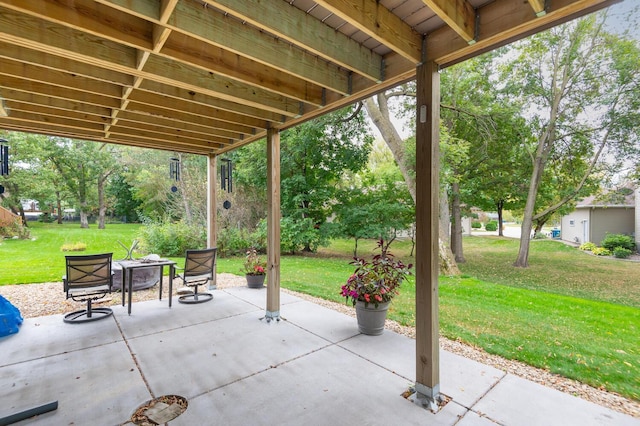 view of patio featuring a fire pit