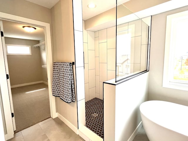 9551 230th St E, Lakeville, MN 55044 - bathroom featuring a walk in shower and a freestanding bath