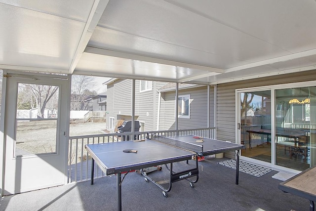 recreation room featuring plenty of natural light