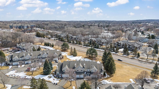 birds eye view of property with a residential view