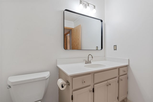 half bath with toilet and vanity