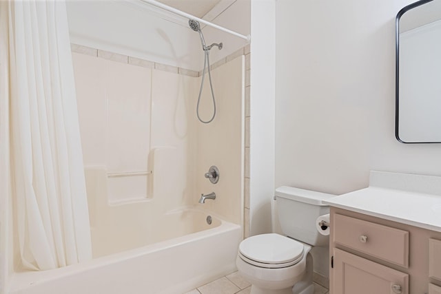 full bath with tile patterned floors, shower / bathtub combination with curtain, toilet, and vanity