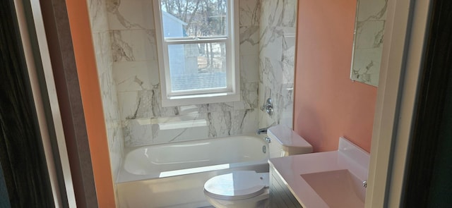 full bath with tub / shower combination, toilet, and vanity