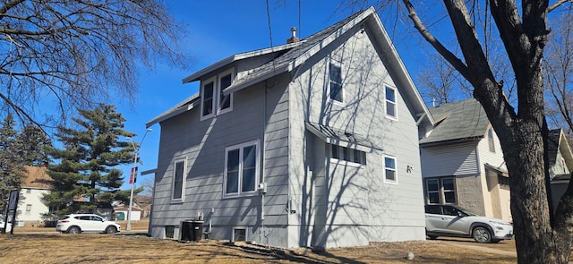 view of property exterior with cooling unit