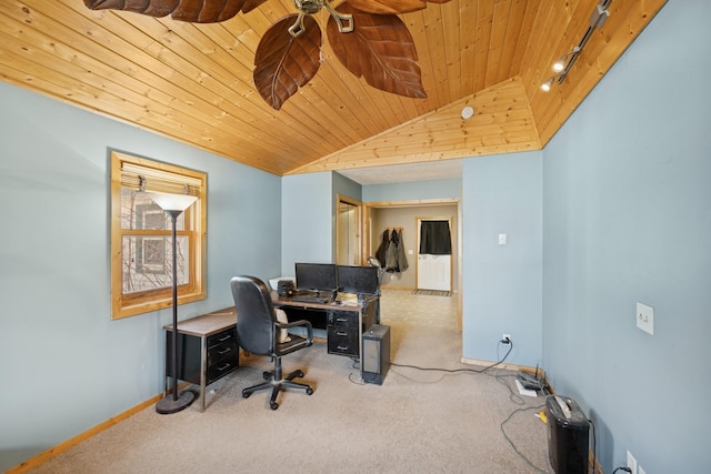 office space with baseboards, lofted ceiling, wood ceiling, and carpet flooring