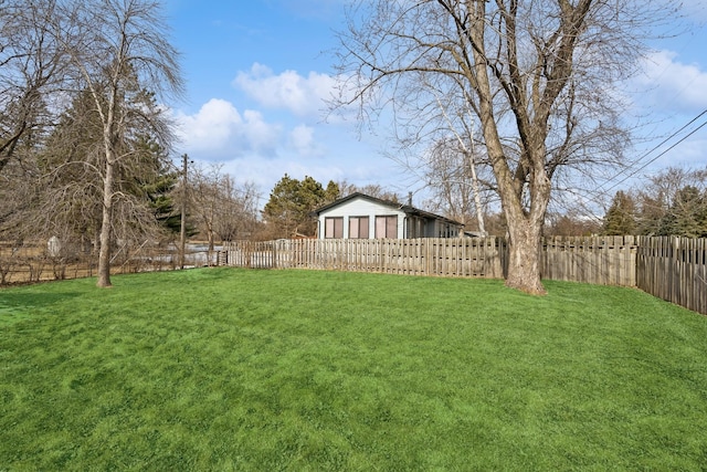 view of yard featuring a fenced backyard