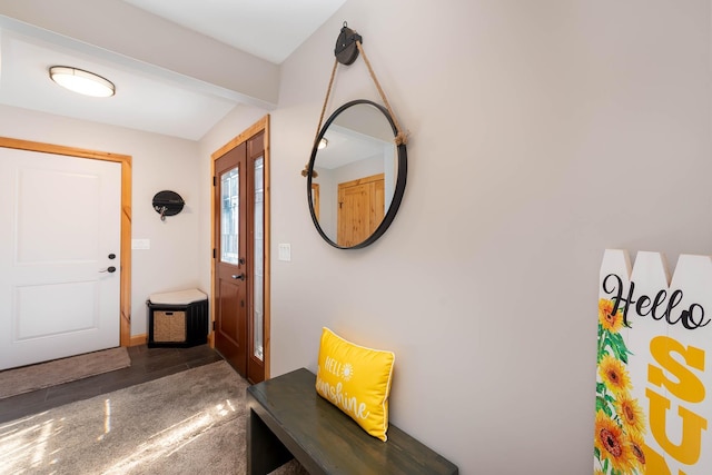 foyer featuring wood finished floors