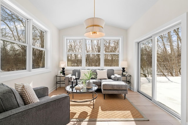 sunroom with lofted ceiling