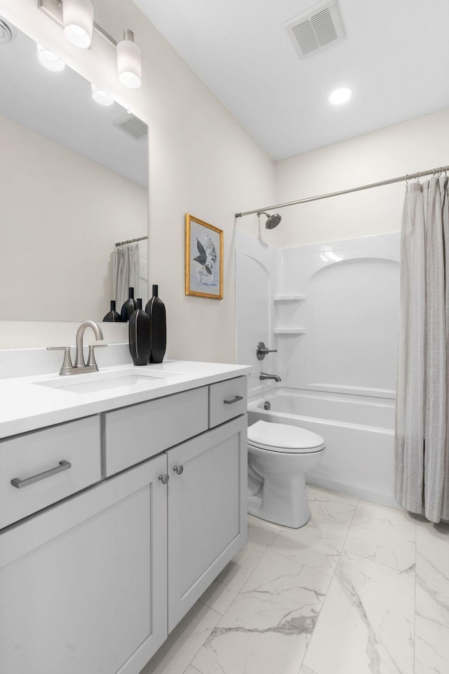 bathroom with vanity, shower / bath combo, toilet, visible vents, and marble finish floor