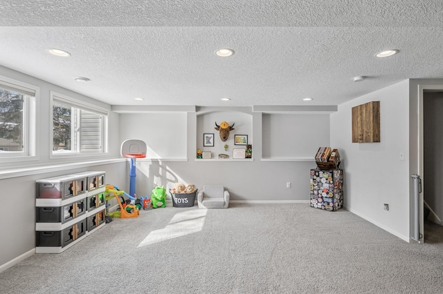 rec room with recessed lighting, baseboards, and carpet