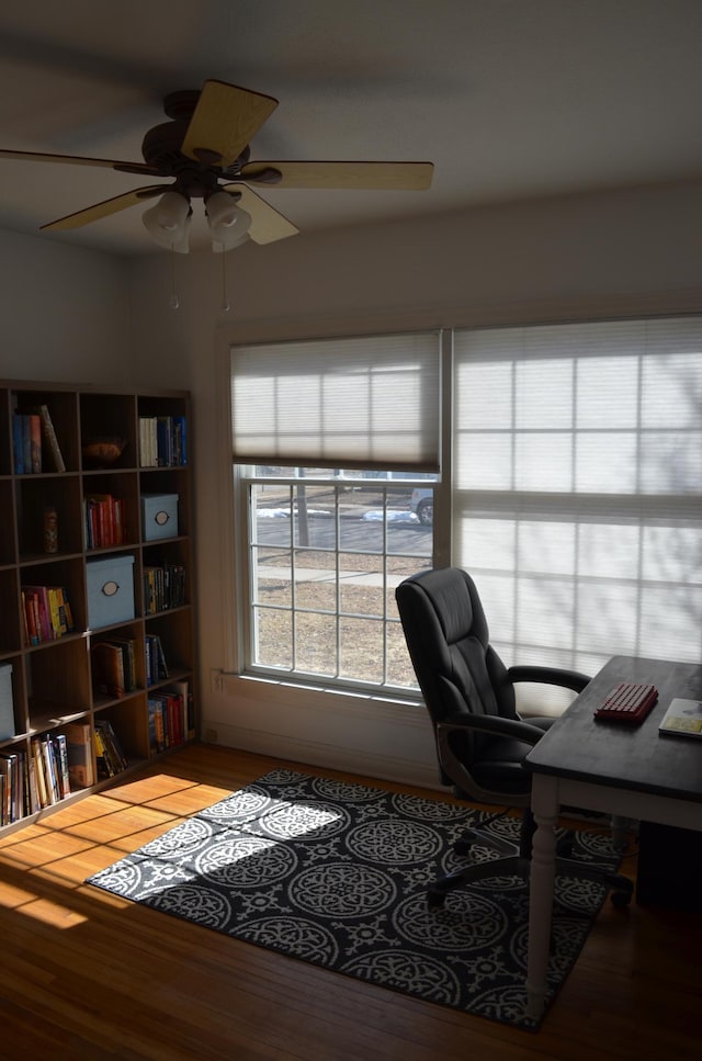 office space featuring ceiling fan and wood finished floors