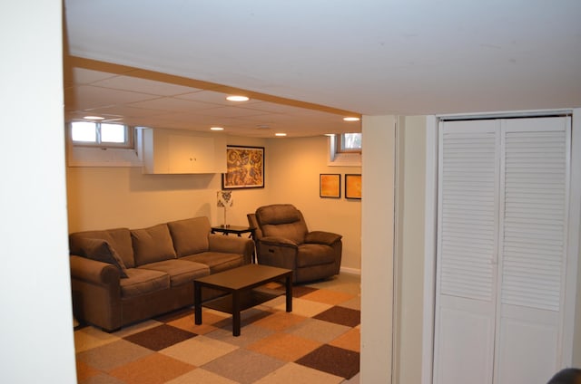 living area with recessed lighting and light floors