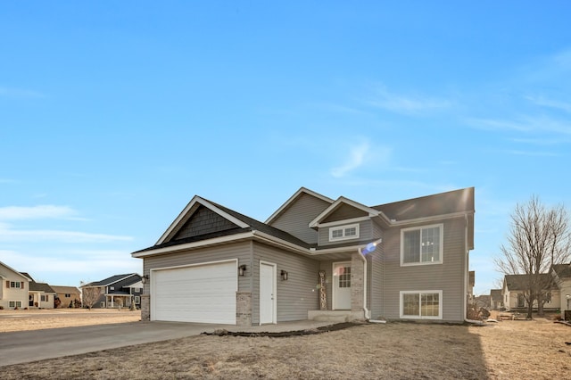 view of front of property featuring driveway and a garage