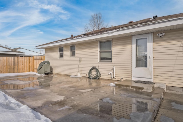 back of house with a patio area and fence