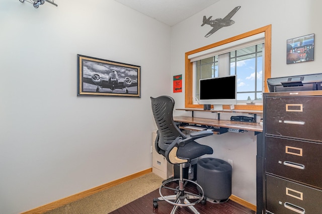 office area featuring baseboards