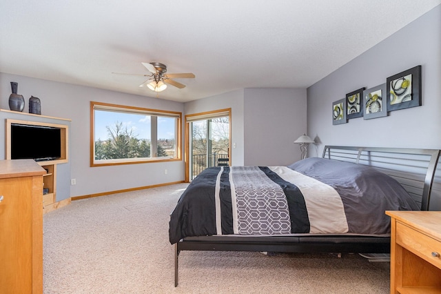 bedroom with baseboards, a ceiling fan, carpet, and access to outside