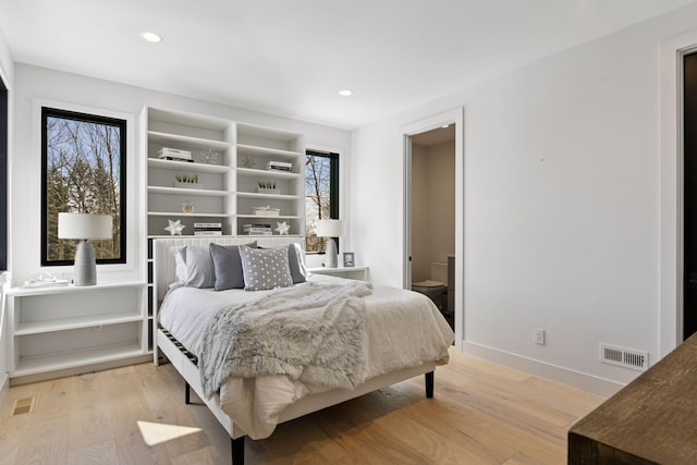 bedroom featuring recessed lighting, visible vents, baseboards, and light wood-style flooring