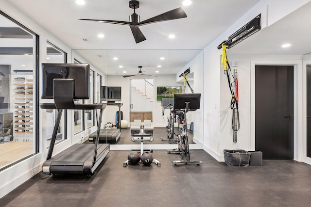 exercise room featuring recessed lighting, baseboards, and ceiling fan