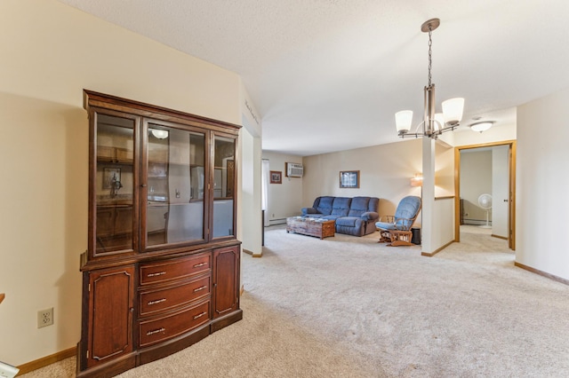 8031 Xerxes Ave S Unit 225, Bloomington, MN 55431 - living area featuring an inviting chandelier, carpet floors, baseboards, and a baseboard heating unit