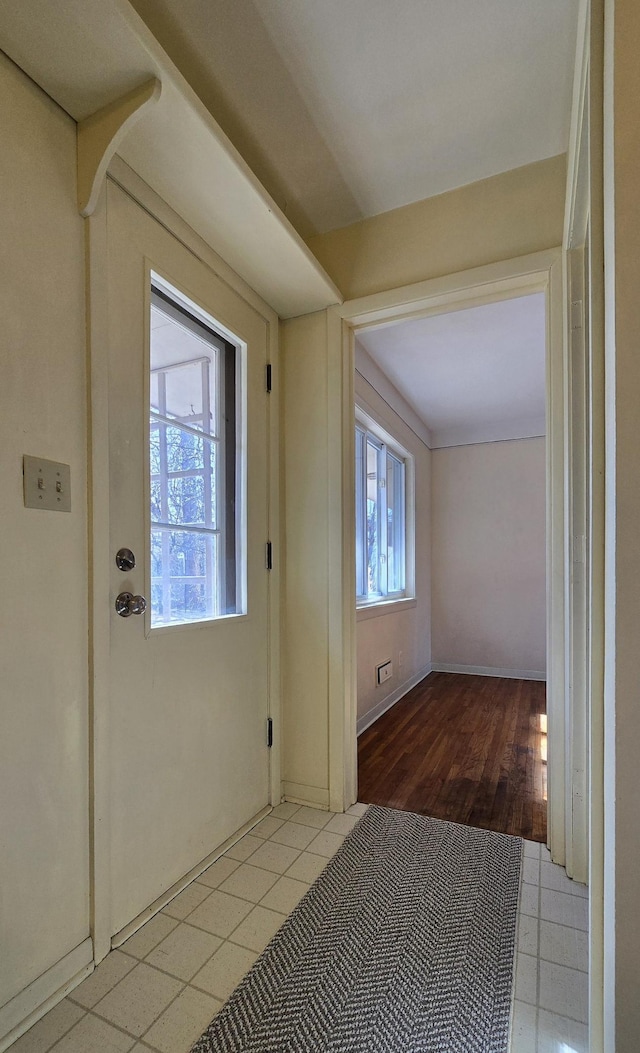 interior space with light tile patterned floors