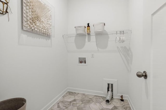 washroom featuring laundry area, baseboards, and washer hookup