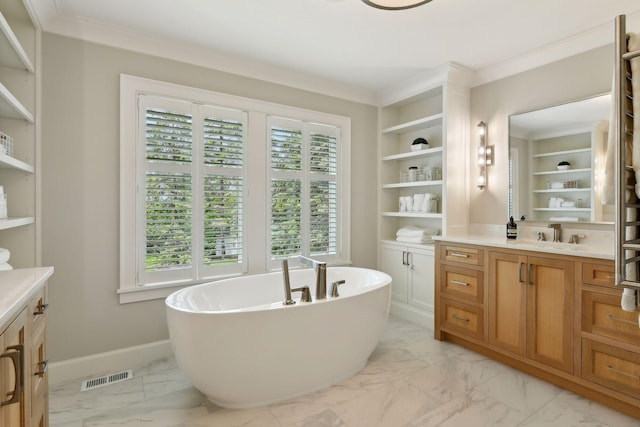 bathroom featuring vanity, baseboards, visible vents, ornamental molding, and marble finish floor