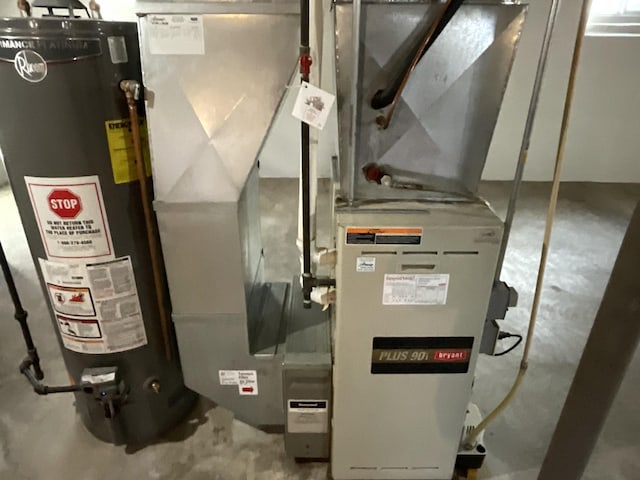 utilities featuring heating unit and gas water heater