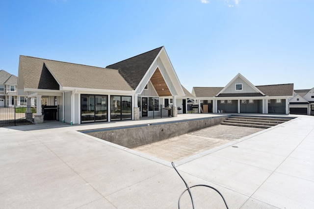 exterior space featuring a patio area and fence