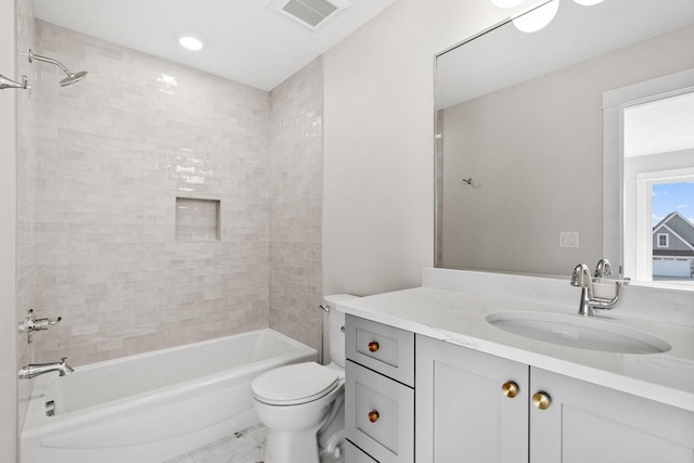 full bathroom with shower / bath combination, marble finish floors, toilet, vanity, and recessed lighting