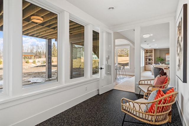 sunroom / solarium with arched walkways