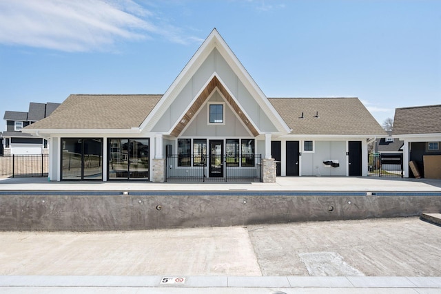 view of building exterior featuring fence