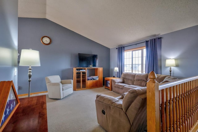 carpeted living area with lofted ceiling, baseboards, and a textured ceiling