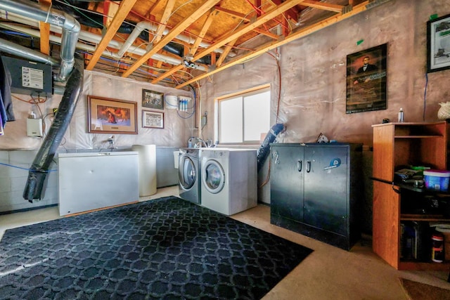 laundry area featuring washer and dryer and laundry area