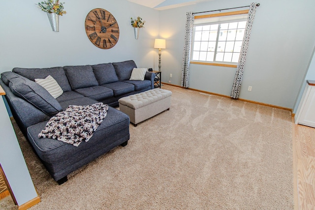 living room with baseboards and carpet floors